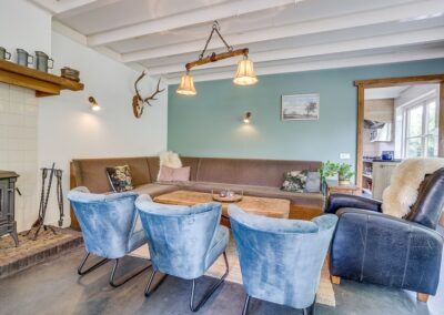 Boerderij Mossel zithoek woonkamer groepsaccommodatie Otterlo